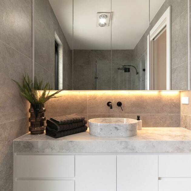 glossy white frameless bathroom vanity with floating cabinet design