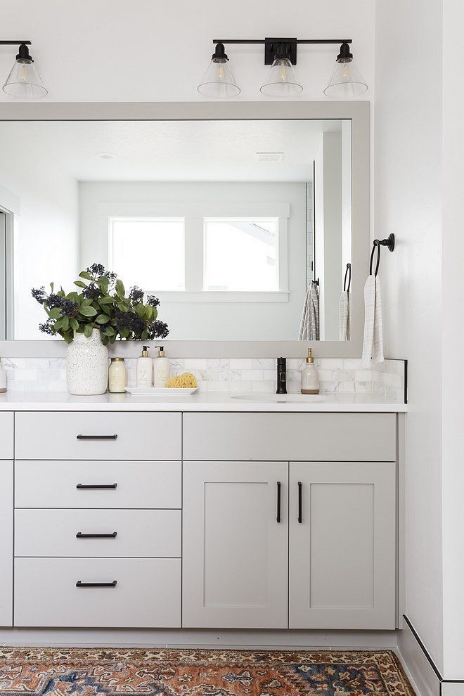 white framed bathroom vanity with sink and storage cabinet by VIC Cabinet