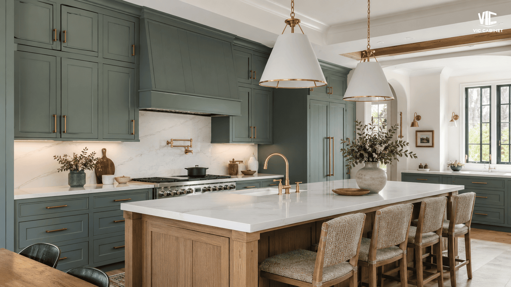 Smoky jade kitchen cabinets with blue-green undertones, white oak accents and brass hardware